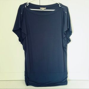 Navy top with snaps on sleeve